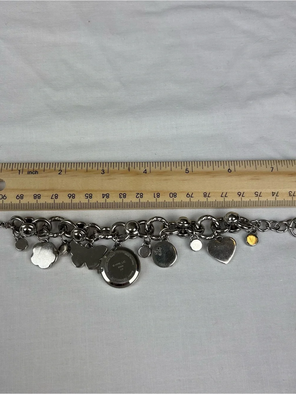 Hallmark Silver-Tone “Mom” Charm Bracelet Watch with Cream Flower